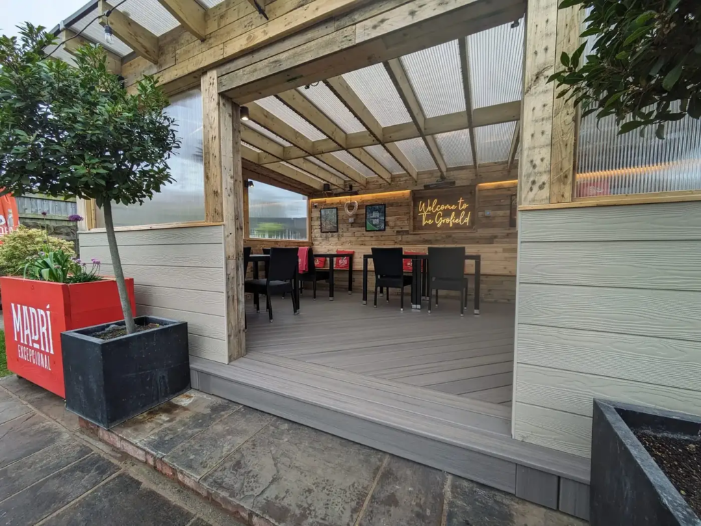 Covered Trex seating area at The Grofield pub, Abergavenny
