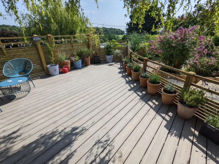 Grey Trex deck with planters