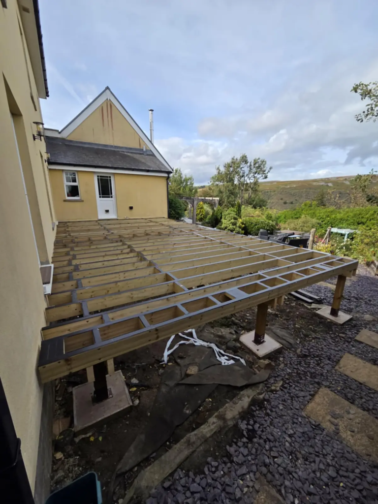 Raised deck frame on posts