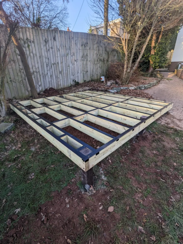 Small garden deck subframe on posts before the boards went down