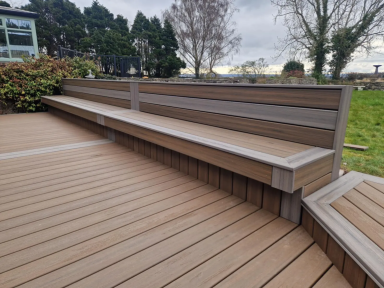 Trex composite deck with a built-in bench along the edge
